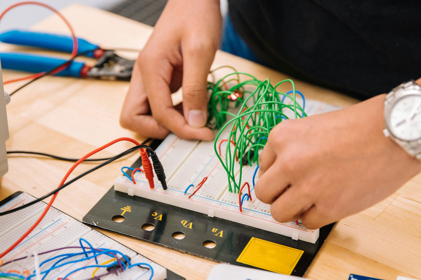 Student building a hands-on STEM electronics project